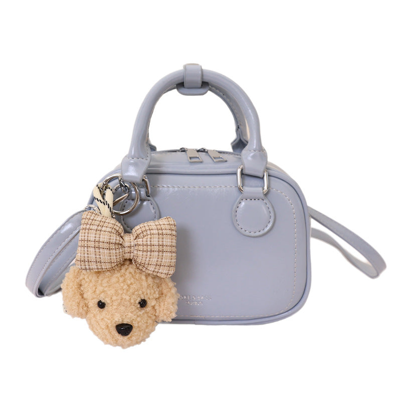 Damen Mini-Handtasche mit abnehmbarem Plüschanhänger