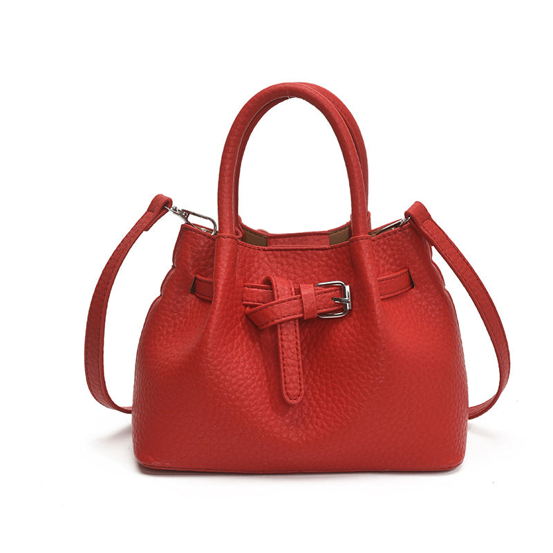 Damen Mini-Handtasche mit stylischem Druckknopfverschluss