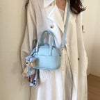 Damen Mini-Handtasche mit verspieltem Tieranhänger