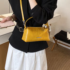 Damen elegante Handtasche mit minimalistischem Design und edlen Akzenten