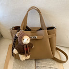 Damen Mini-Handtasche mit süßem Plüsch-Anhänger