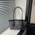 Damen elegante Handtasche aus strukturiertem Material