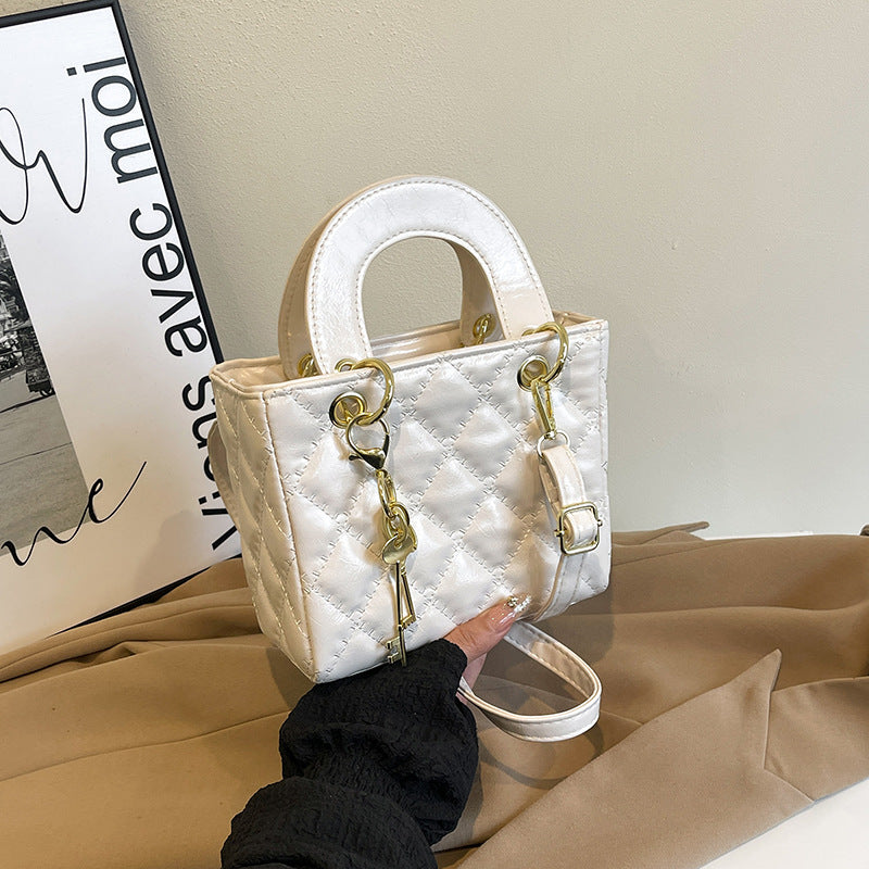 Damen elegante Mini-Handtasche mit gestepptem Design