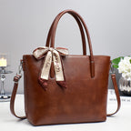 Damen elegante Schultertasche mit verspieltem Schleifenakzent