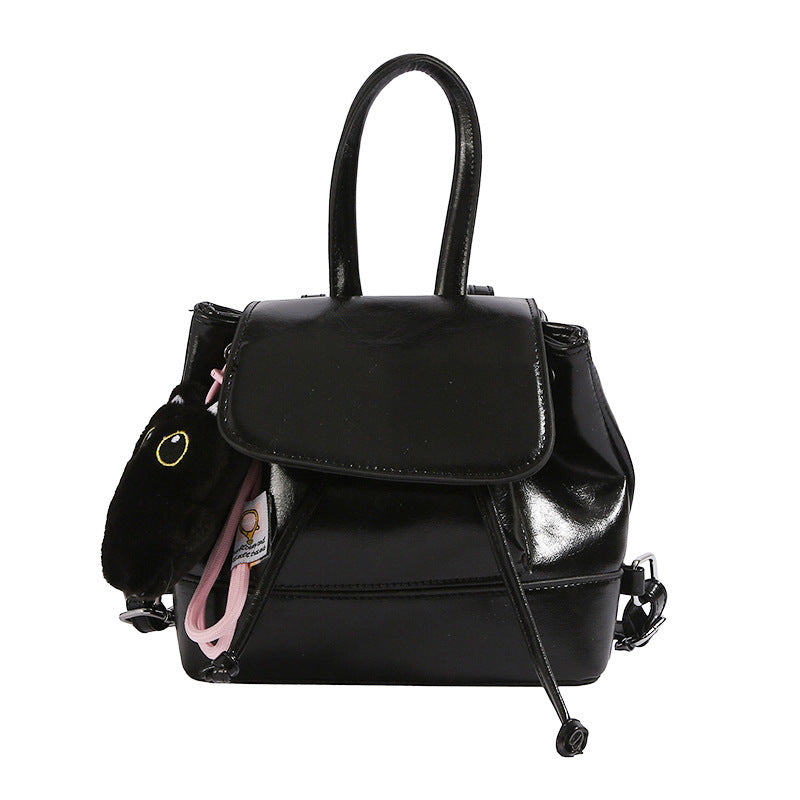 Damen Mini-Rucksack mit verspieltem Anhänger