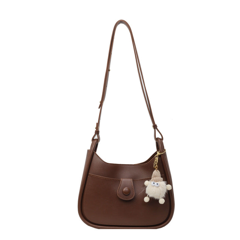 Damen Schultertasche aus hochwertigem Kunstleder mit verspieltem Charme