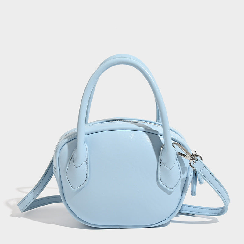 Damen Mini-Handtasche mit luxuriösen Lederakzenten
