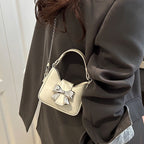 Damen Mini-Handtasche mit stylischem Schleifenverschluss