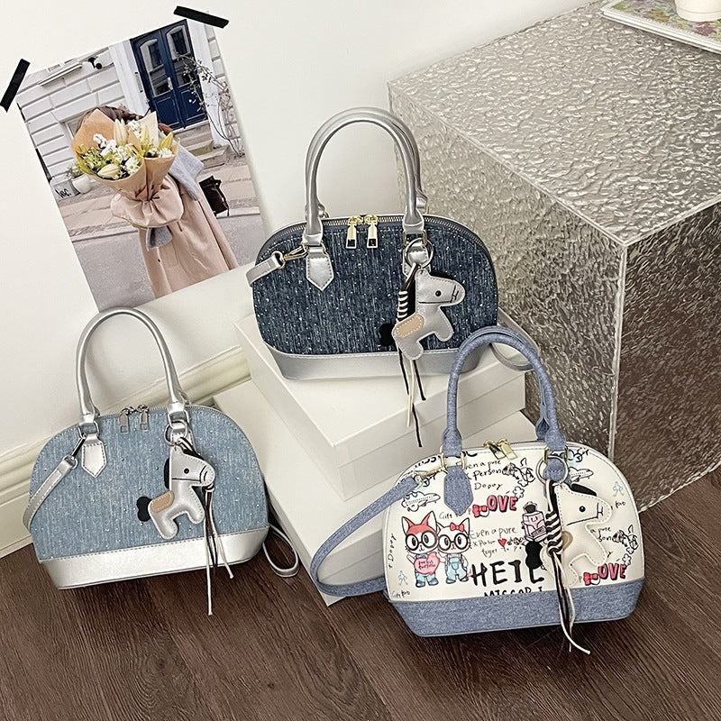Damen Mini-Handtasche mit Tieranhänger und modischem Denim