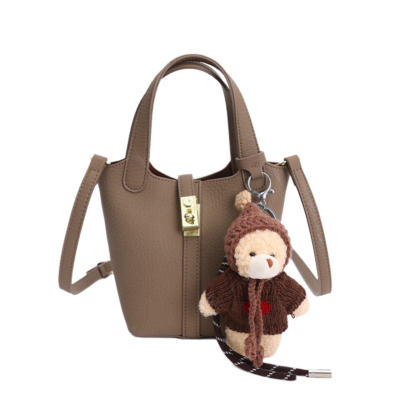 Damen Mini-Handtasche mit verspieltem Tieranhänger