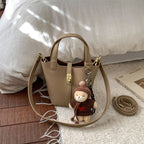 Damen Mini-Handtasche mit verspieltem Tieranhänger