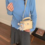 Damen Mini-Handtasche mit süßem Tier-Anhänger