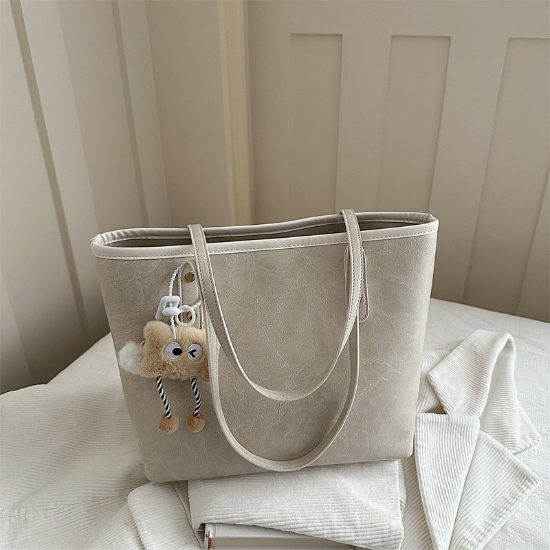 Damen klassische Tote-Tasche mit charmanten Plüschspielzeug-Anhänger