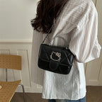 Damen Mini-Handtasche mit dekorativer Steppung und verspieltem Katzenmotiv