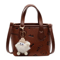 Damen Mini-Handtasche mit süßem Anhänger