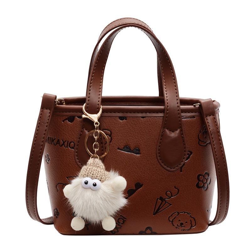 Damen Mini-Handtasche mit süßem Anhänger
