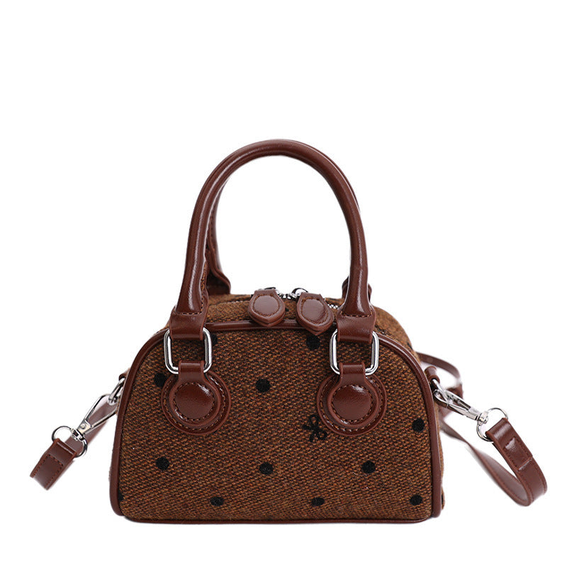 Damen Mini-Handtasche aus hochwertigem Material mit einer strukturierten Oberfläche
