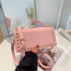 Damen Mini-Handtasche mit funkelndem Obermaterial und goldenen Nieten