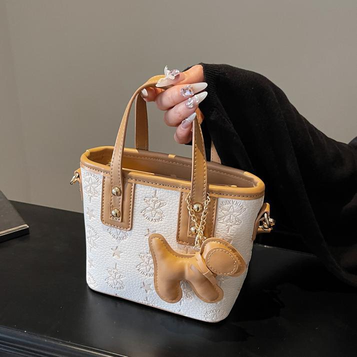 Damen Mini-Handtasche mit verspieltem Hund Charm