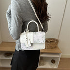 Damen elegante Mini-Handtasche mit floralem Design