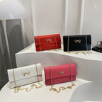 Damen elegante Clutch im minimalistischen Design mit goldenen Akzenten