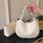 Damen Schultertasche aus hochwertigem Kunstleder mit modischem Besatz