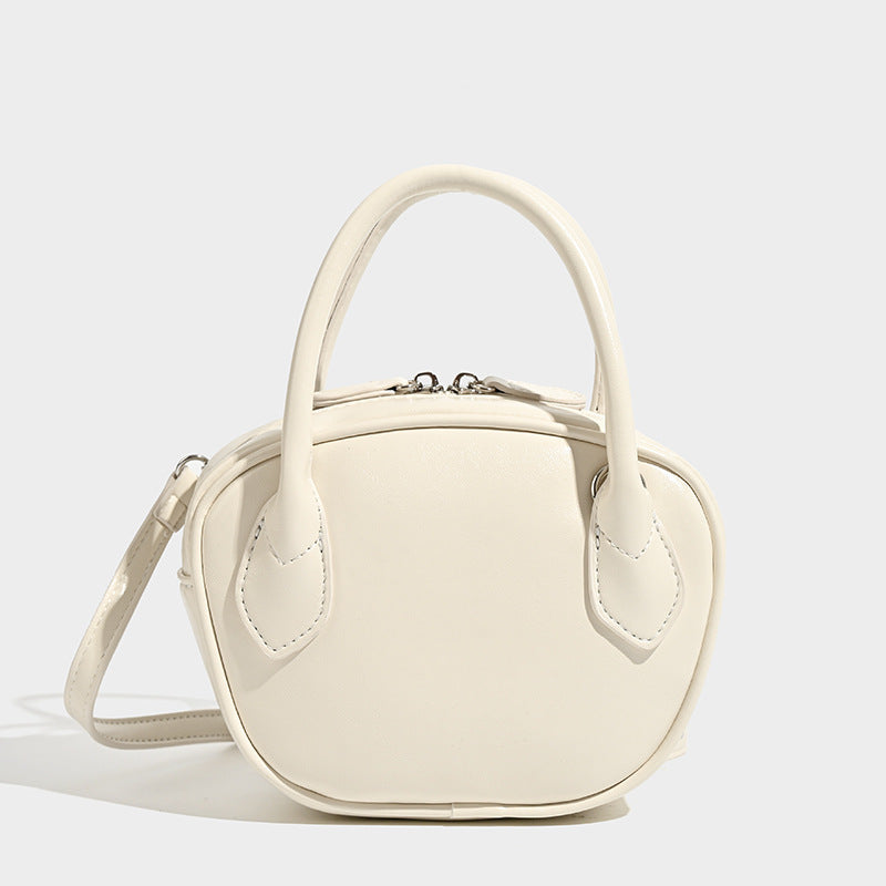 Damen Mini-Handtasche mit luxuriösen Lederakzenten
