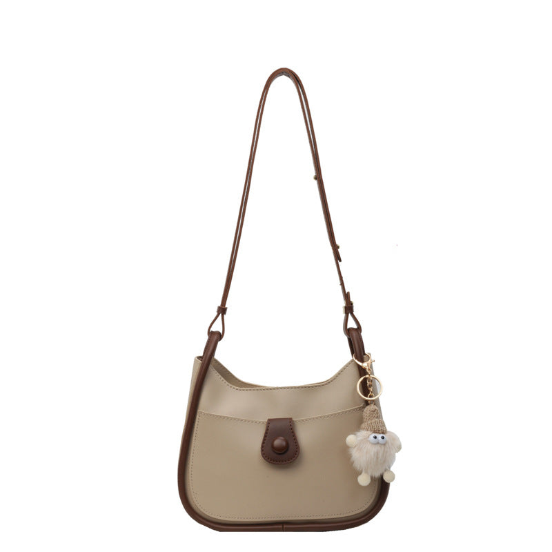 Damen Schultertasche aus hochwertigem Kunstleder mit verspieltem Charme