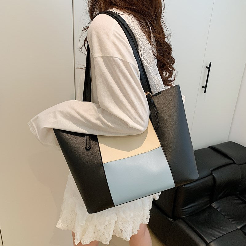 Damen geräumige Tasche mit eleganten Farbblockdetails