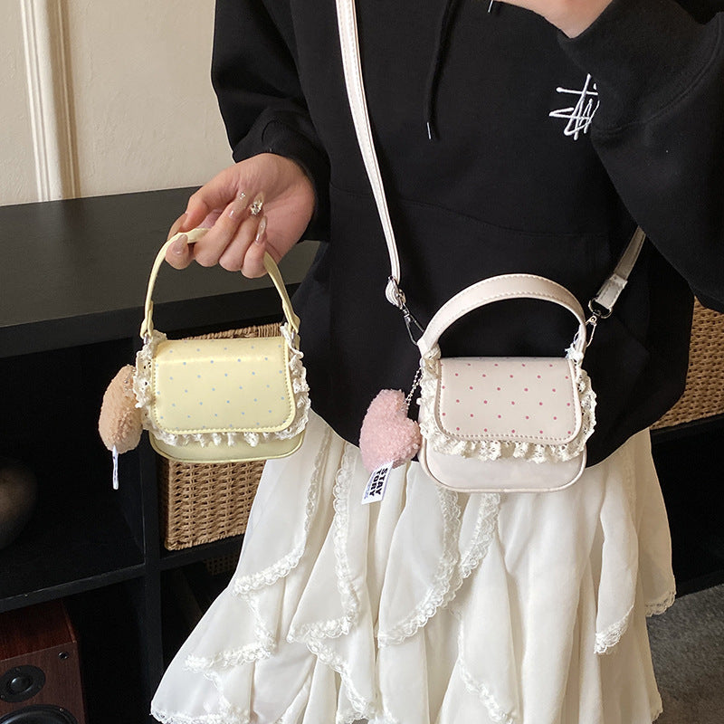 Damen Mini-Handtasche mit verspieltem Design und einzigartigen Details