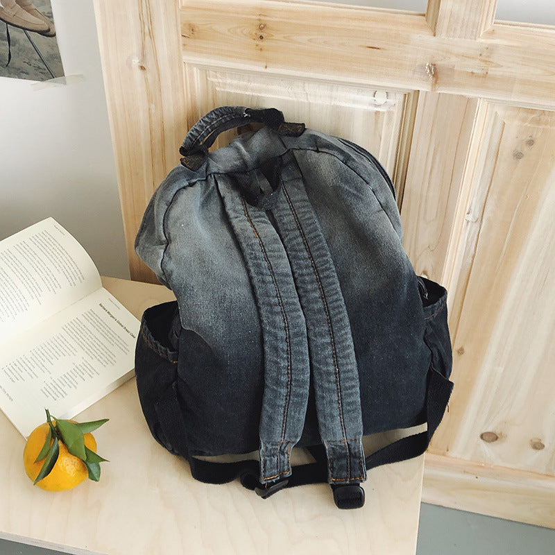 Kreativer Grafikdruck Denim-Schulrucksack