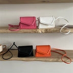 Damen Mini-Handtasche mit eleganter Verschlussmechanik