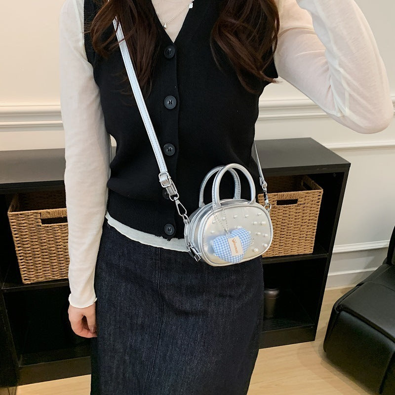 Damen trendige Mini-Handtasche mit auffälligen Perlenapplikationen