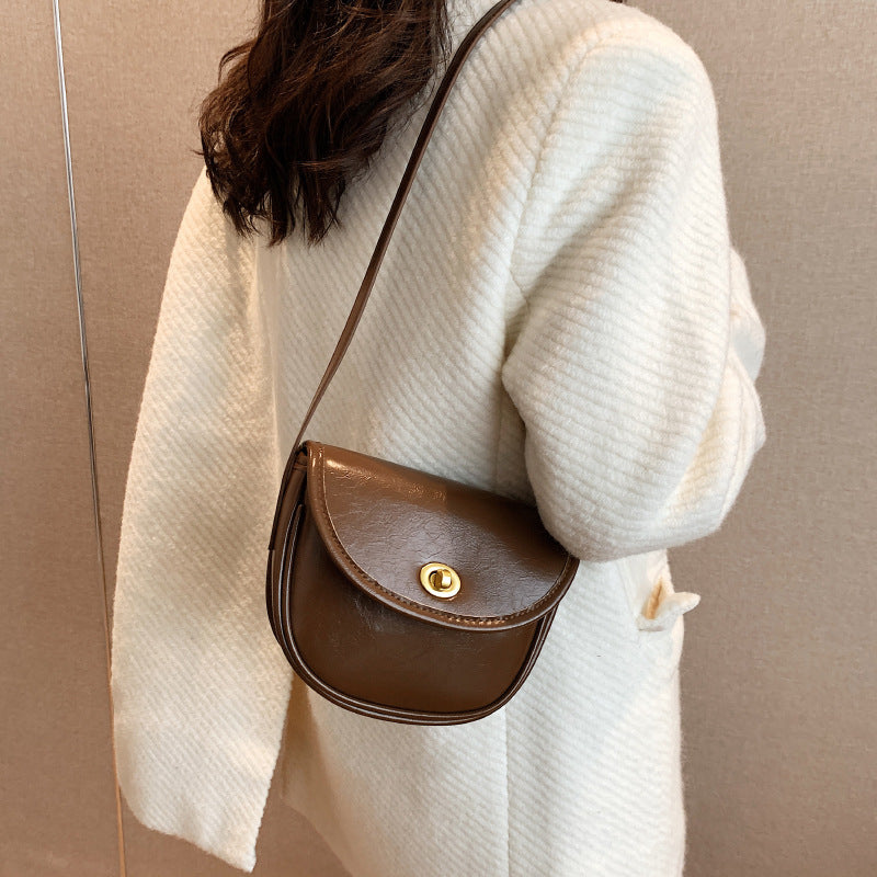 Damen Schultertasche im eleganten Retro-Design mit goldenen Akzenten