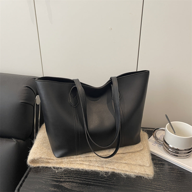 Damen elegante Tragetasche mit minimalistischer Struktur