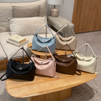 Damenhandtasche mit flexiblem Riemen und elegantem Design