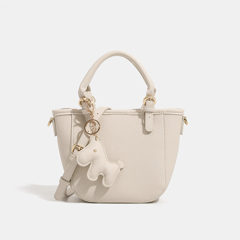 Damen Mini-Handtasche mit verspieltem Tieranhänger
