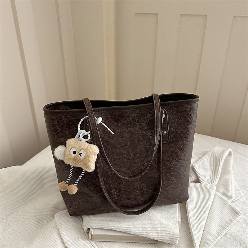 Damen klassische Tote-Tasche mit charmanten Plüschspielzeug-Anhänger