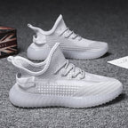 Damen sportliche Sneakers mit nahtloser Mesh-Struktur und flexibler Sohle
