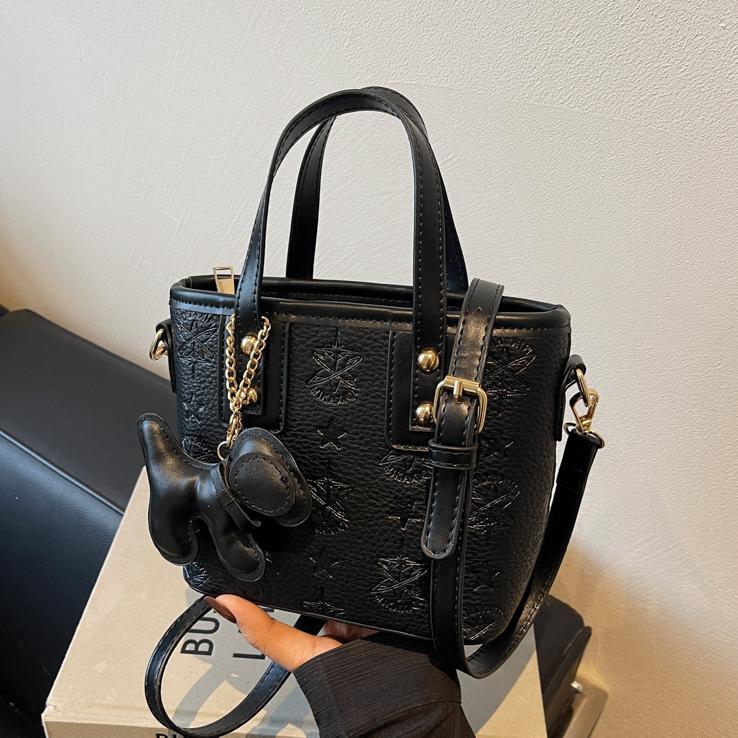 Damen Mini-Handtasche mit verspieltem Hund Charm