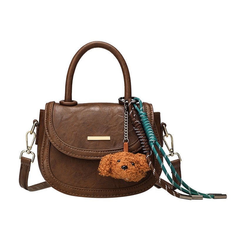 Damen Mini-Handtasche mit verspieltem Detail und hochwertigem Kunstleder
