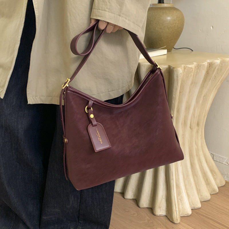 Damen elegante Schultertasche aus weichem Leder