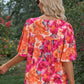 Blouse florale à manches