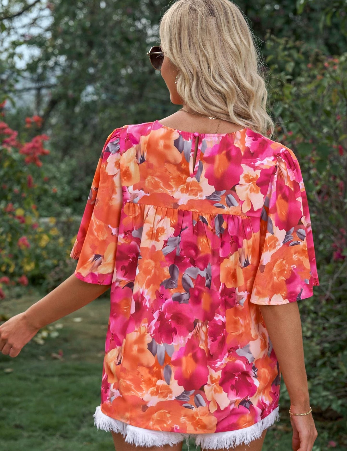 Blouse florale à manches