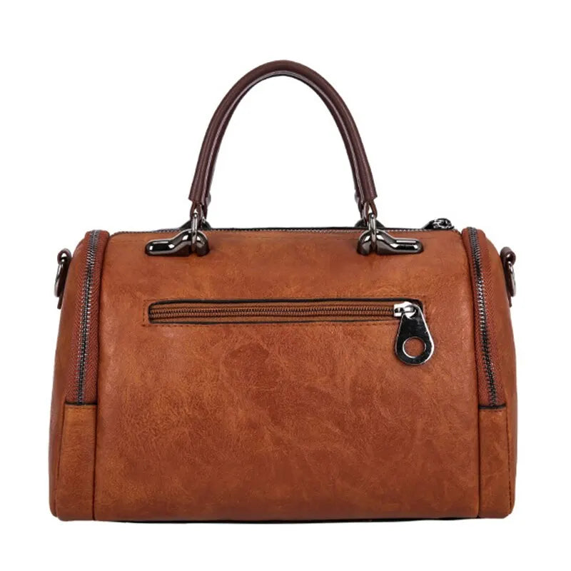 Geräumige Handtasche aus weichem Leder mit Tragriemen und Reißverschlussverschluss