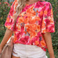 Blouse florale à manches