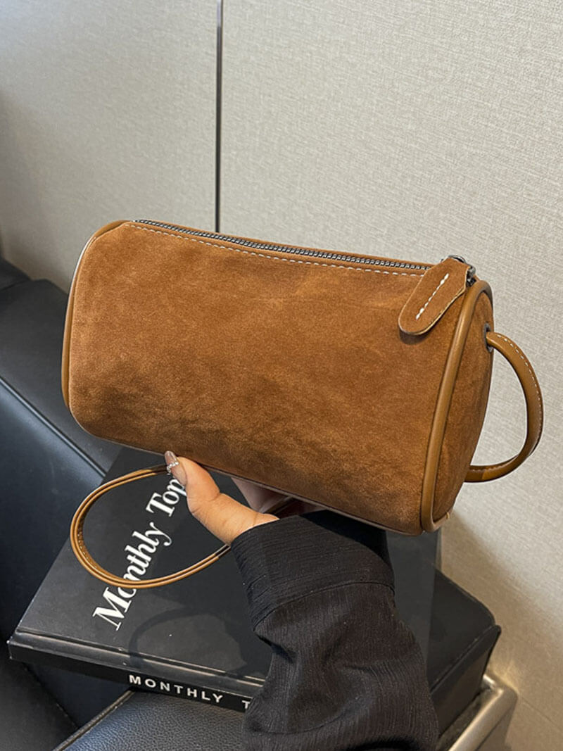 Elegante Schultertasche aus Wildleder