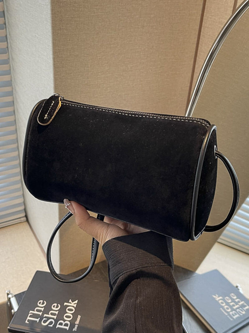 Elegante Schultertasche aus Wildleder