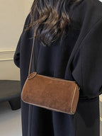 Elegante Schultertasche aus Wildleder
