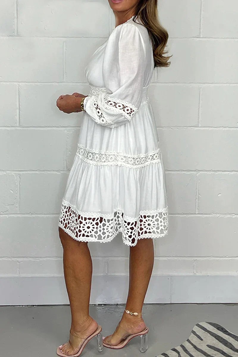 Robe en dentelle de coton avec col en V